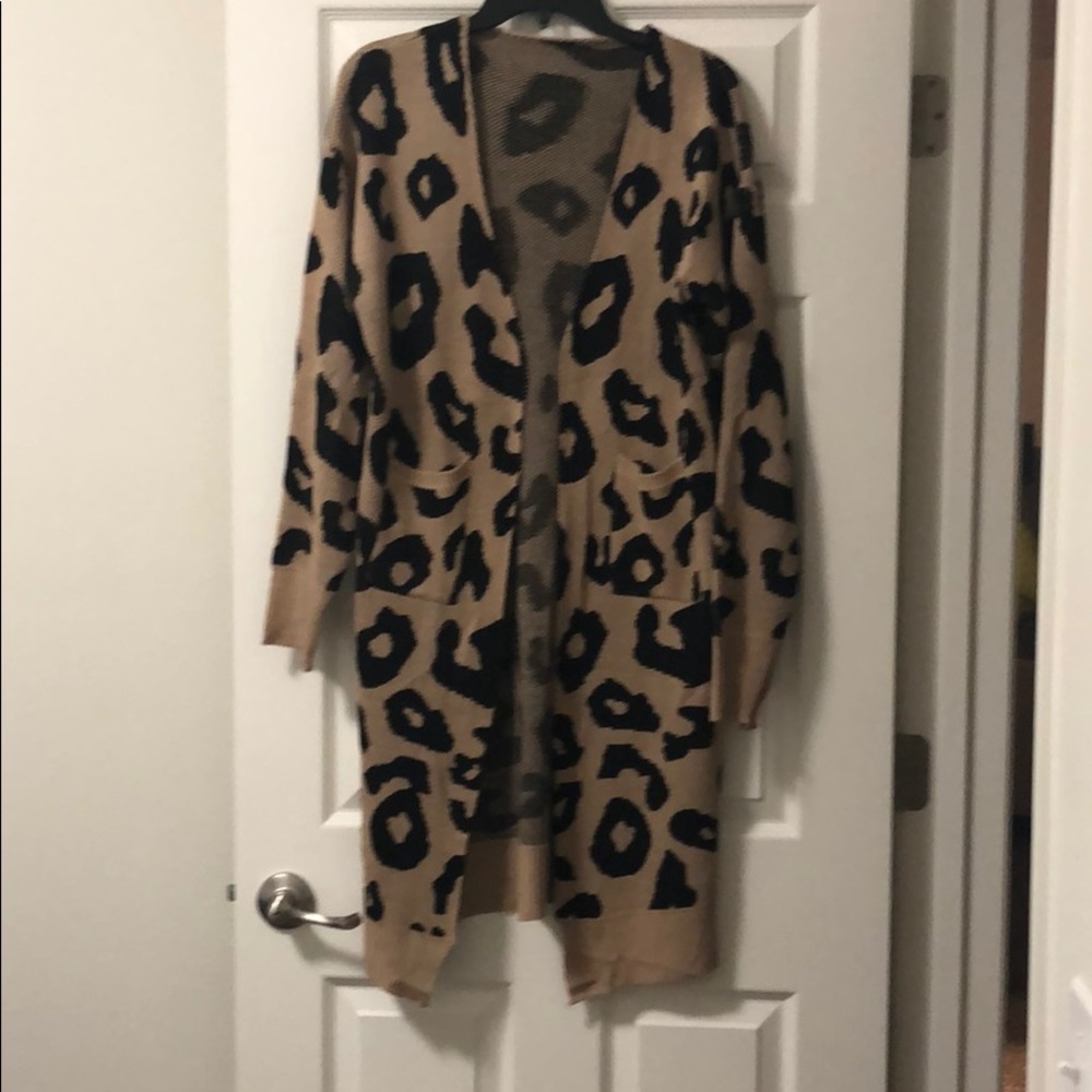 NWOT. Longer length cardigan sweater.